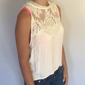 Beautiful white lace open back top.